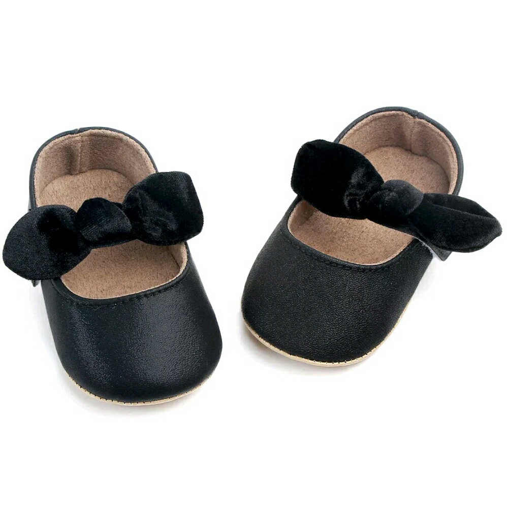 black and gold baby shoes